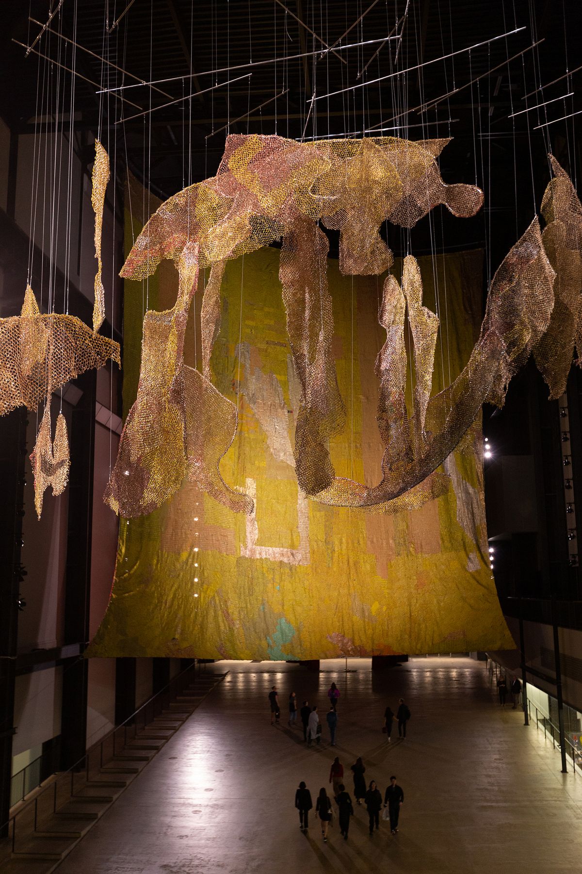 Installation view of Hyundai Commission El Anatsui Behind the Red Moon, Tate Modern, London, 2024. Courtesy Tate Modern