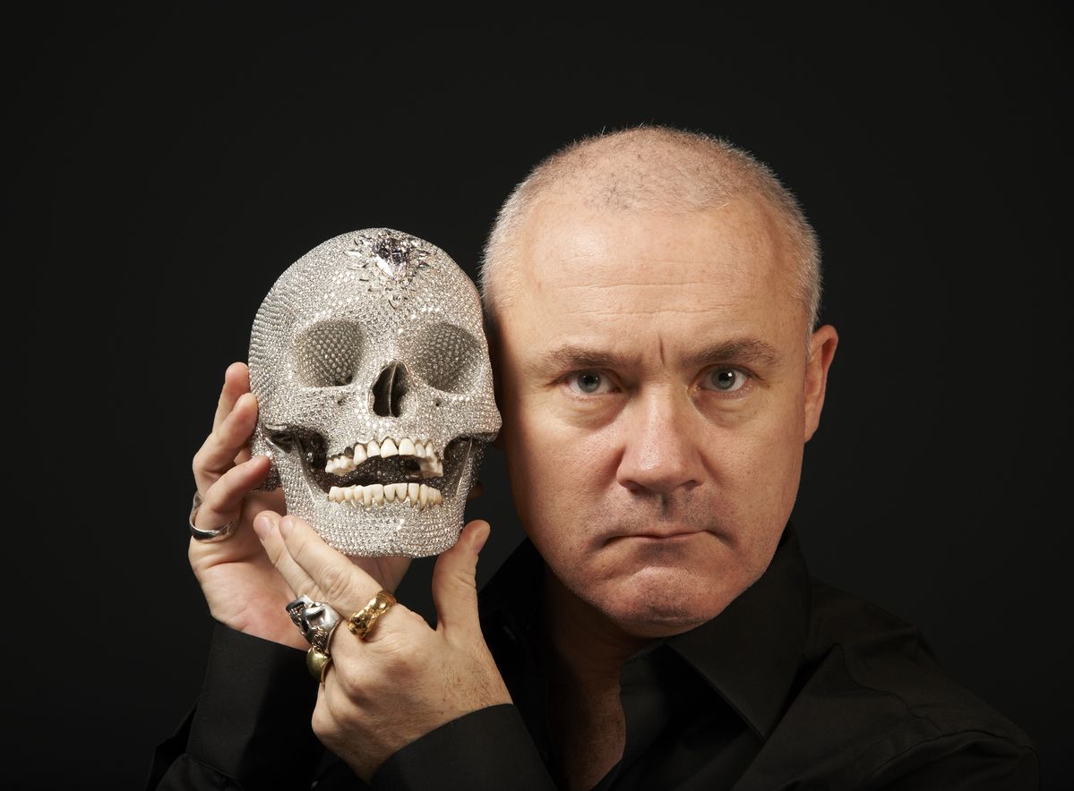 Damien Hirst with For The Love of God, 2012 1_Photographed by Prudence Cuming Associates © 2026 Damien Hirst and Science Ltd. All rights reserved, DACS