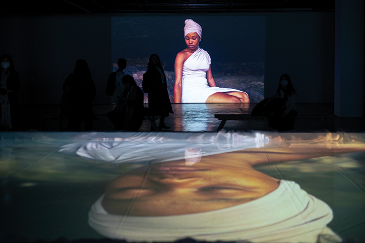 Buhlebezwe Siwani, <The Spirits Descended (Yehla Moya)>, 2022, Film still, video installation and pool with water 10 mins, 5 secs. Courtesy of the artist and Galeria Madragoa